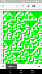 Screenshot of a spreadsheet on my phone, showing white and green cells in a cellular automaton pattern