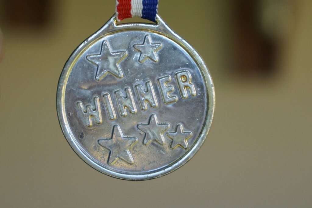 Photo of a medal with 'WINNER' written on it