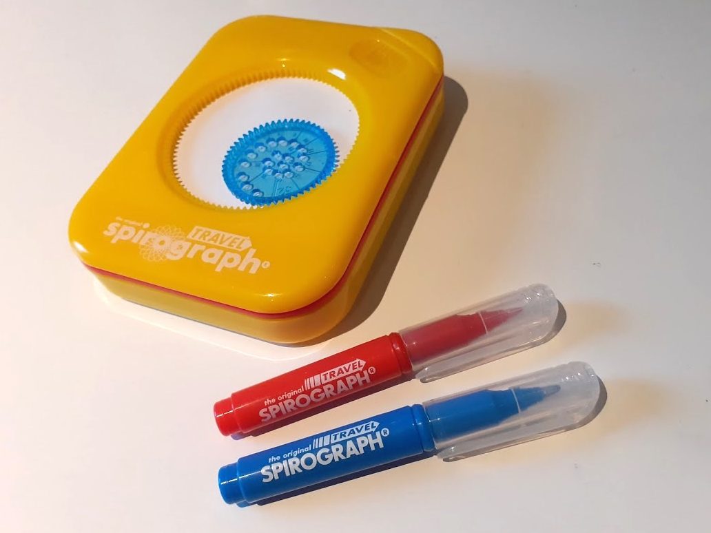 Travel Spirograph kit, with blue and red pens