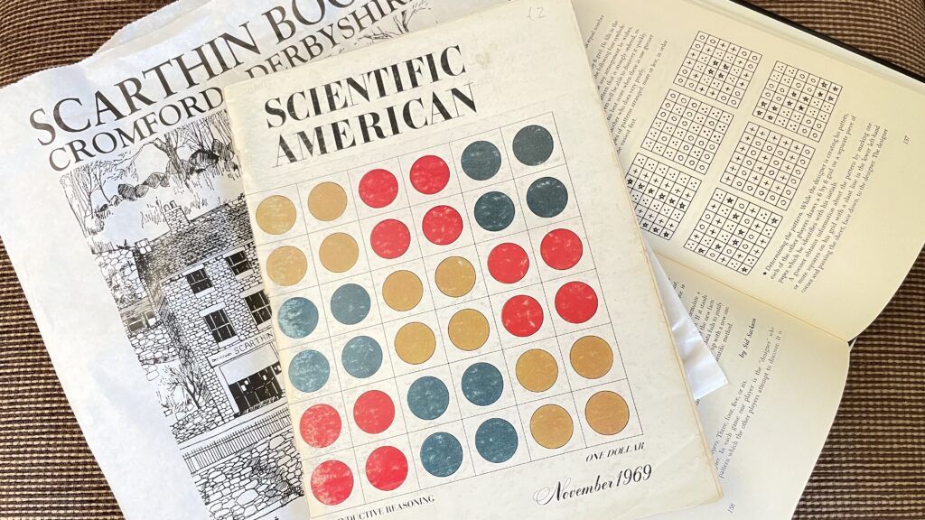 Copy of Scientific American from November 1969 on top of a Scarthin Books bag and a copy of Sid Sackson's A Gamut of Games open to the instructions for Patterns II.
