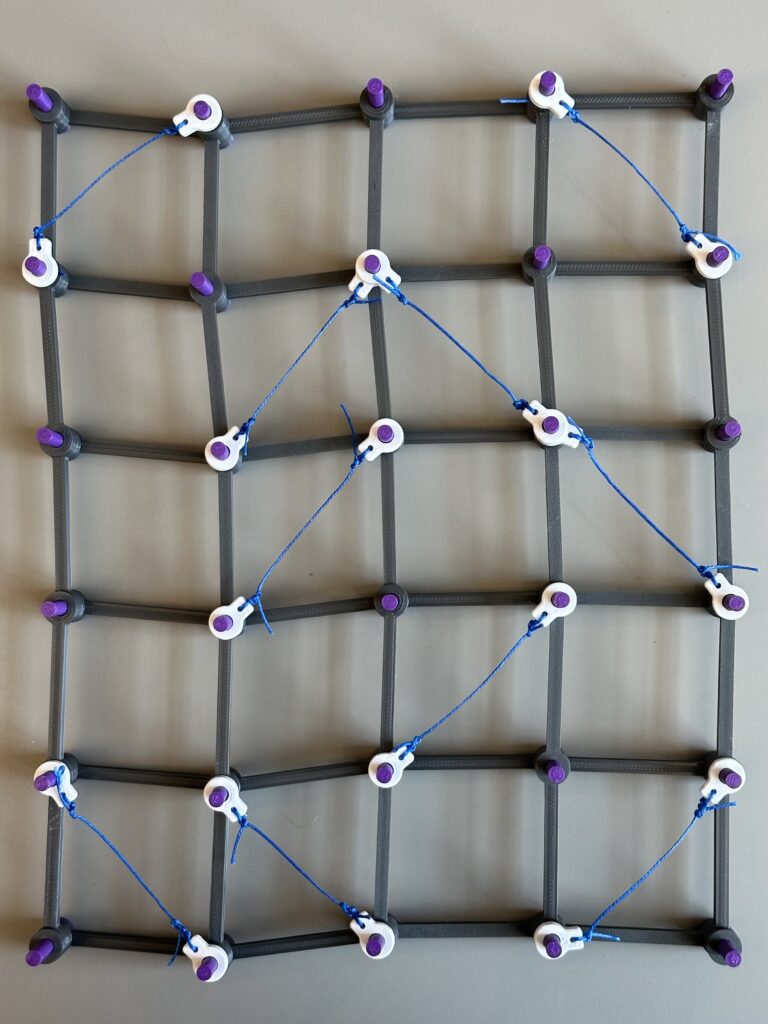 A square grid with bracing wires in a different arrangement.