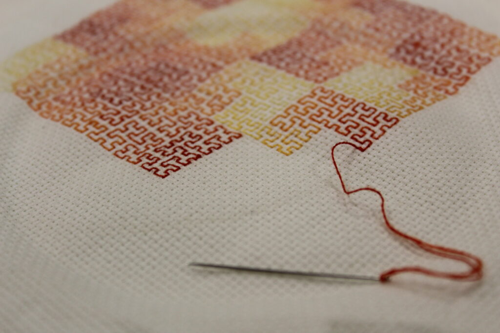 Embroidery of space-filling curve.