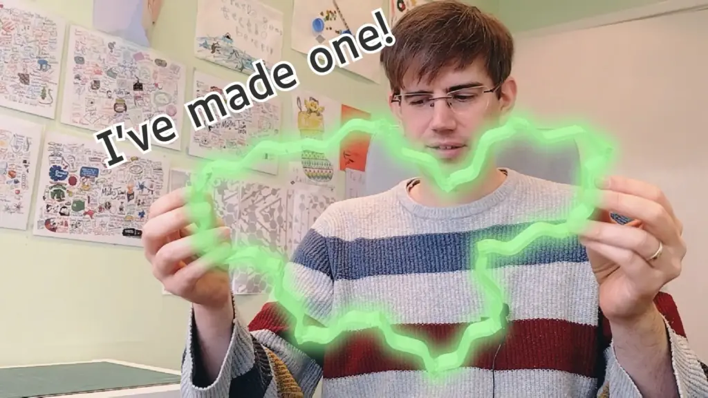 Christian holding a big spectre monotile, with the label "I've made one!"